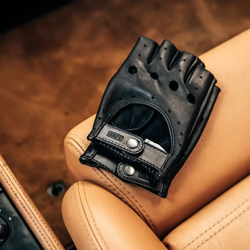 fingerless driving gloves all black front